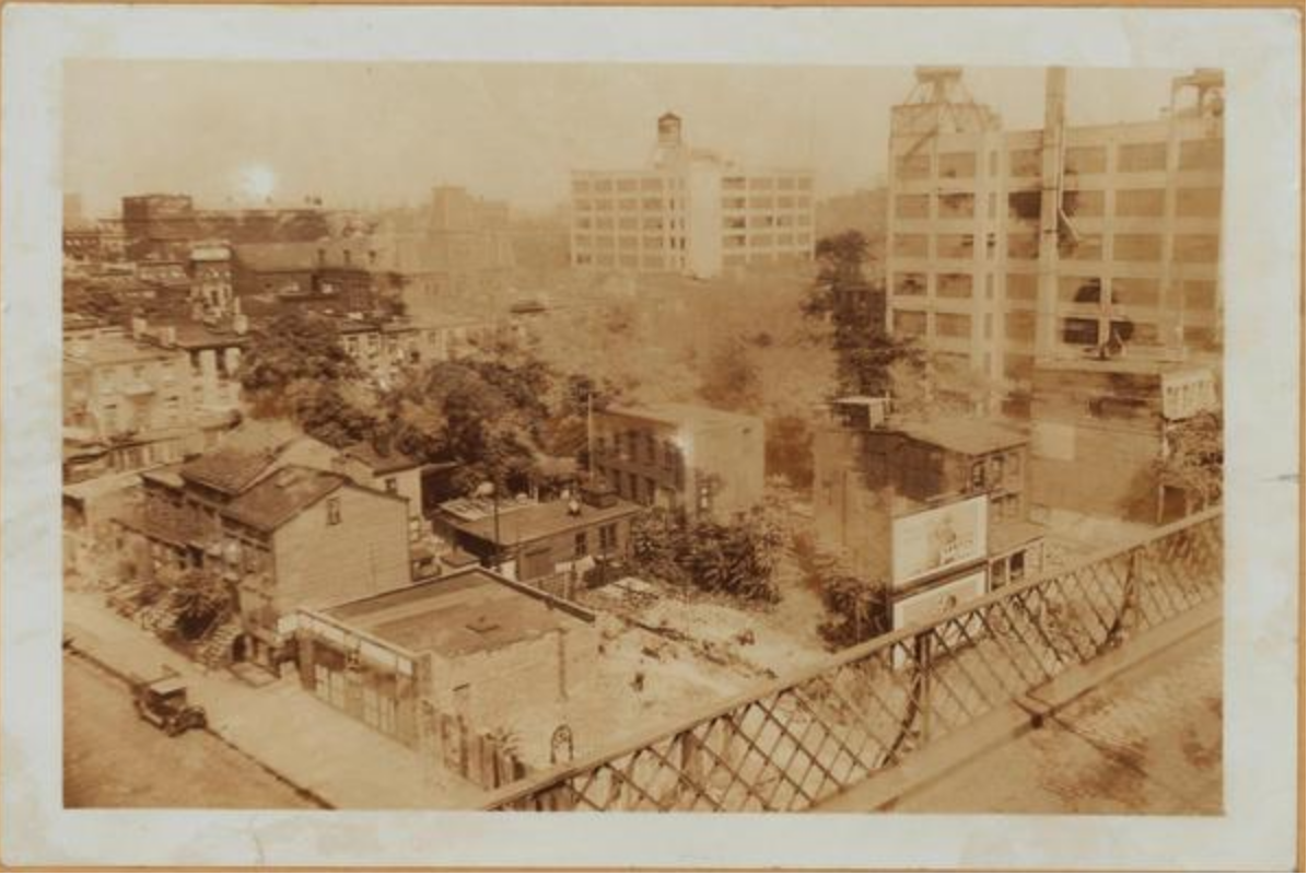 Wythe Ave., east side, north from South 5th Street. This view from the Williamsburg Bridge, shows in the foreground, parallel with the bridge, a group of frame houses that are to be demolished. October 19, 1930. P. L. Sperr.
